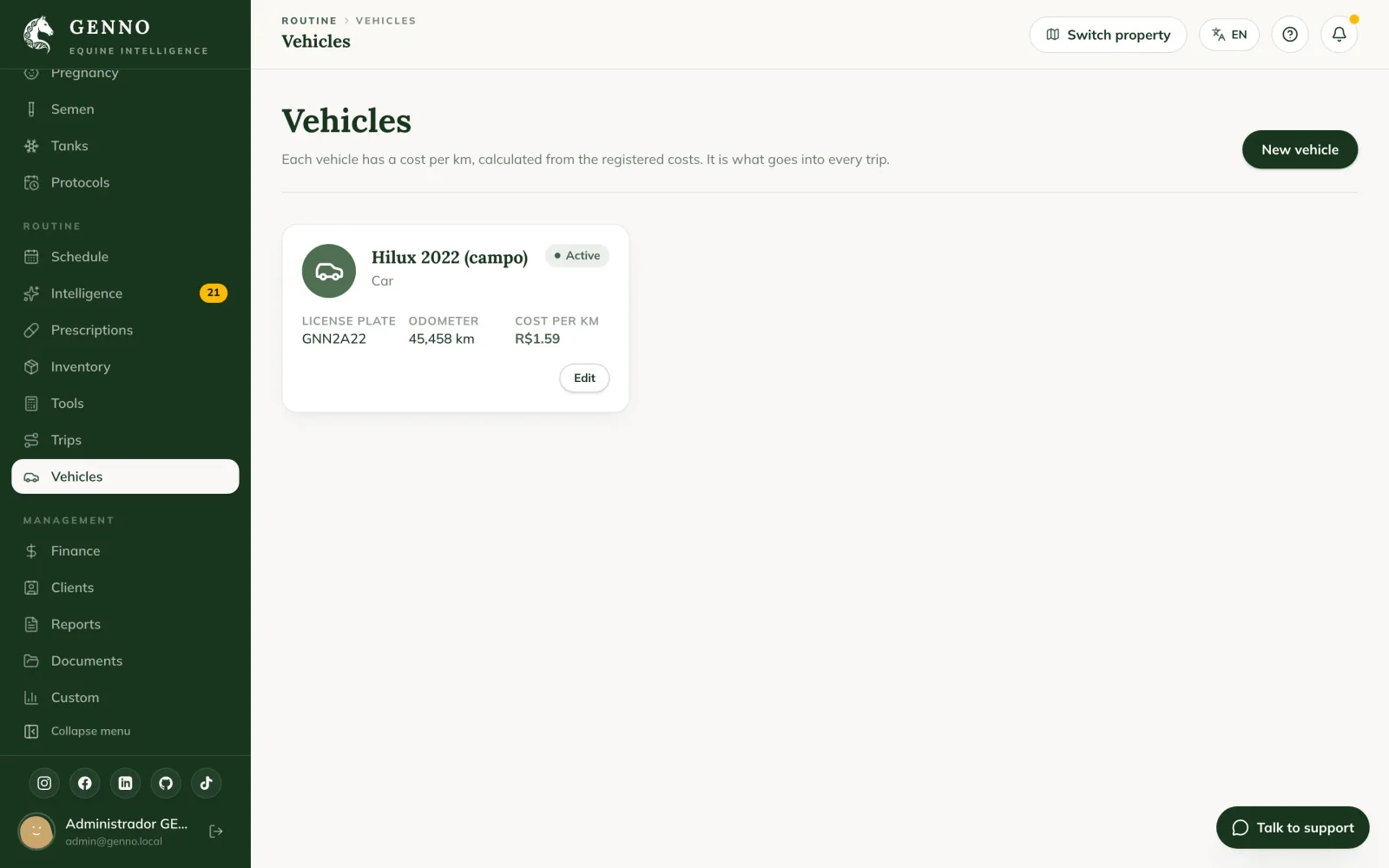 Vehicles page on the web, with a card per vehicle showing icon, type, plate, odometer and cost per km